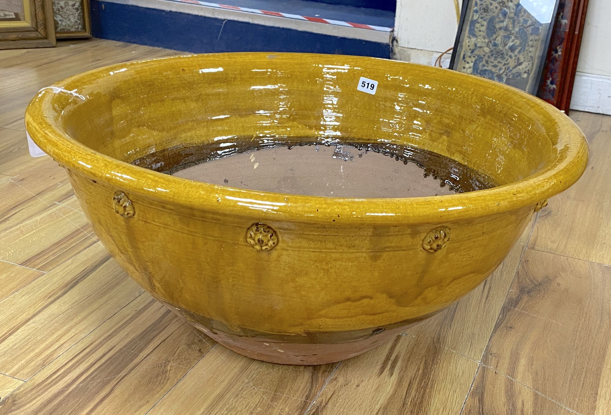 A French pottery large slipware bowl, Dia 69cm